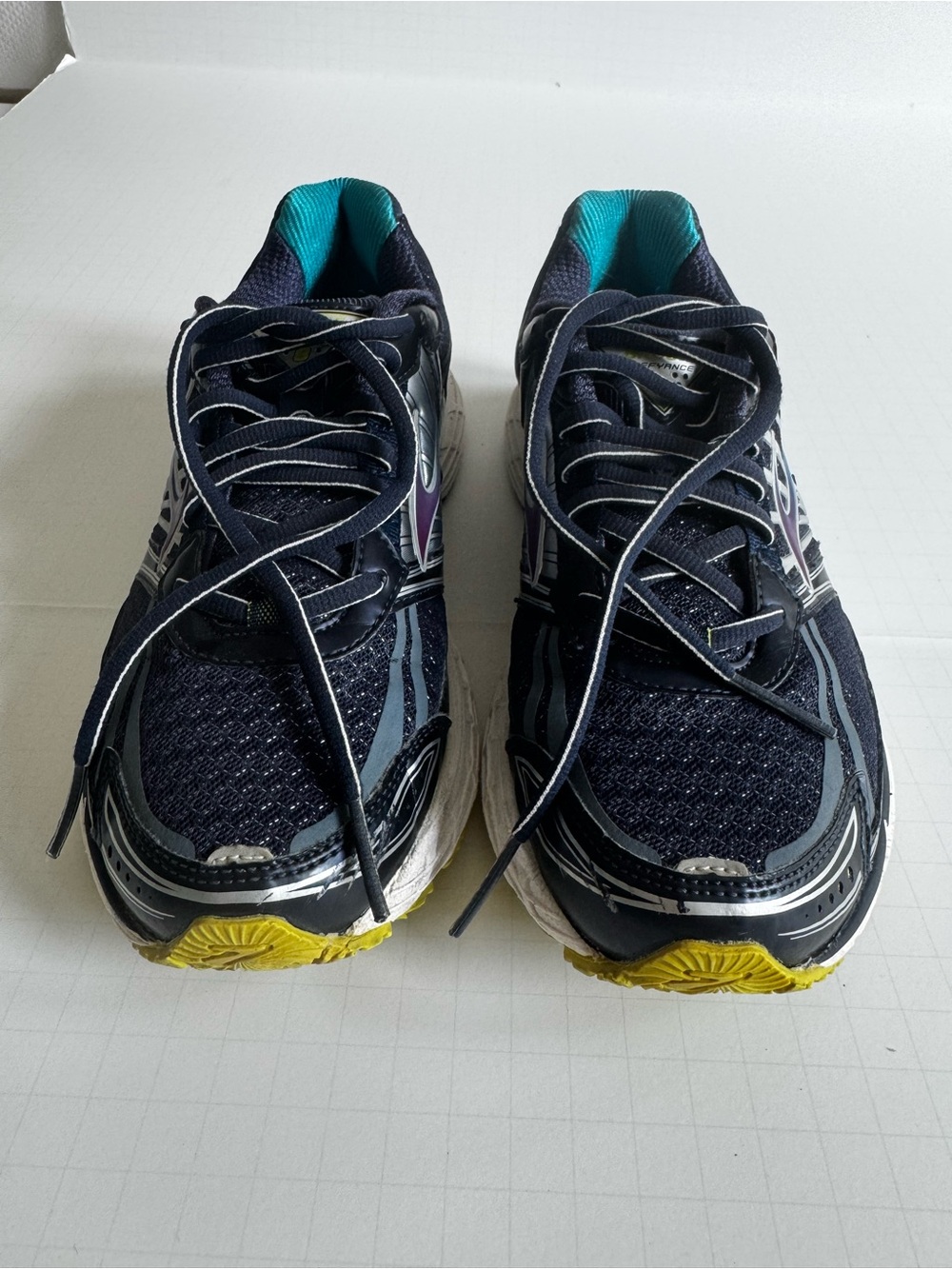 Brooks Women’s Navy Running Shoes with Teal and Yellow Accents